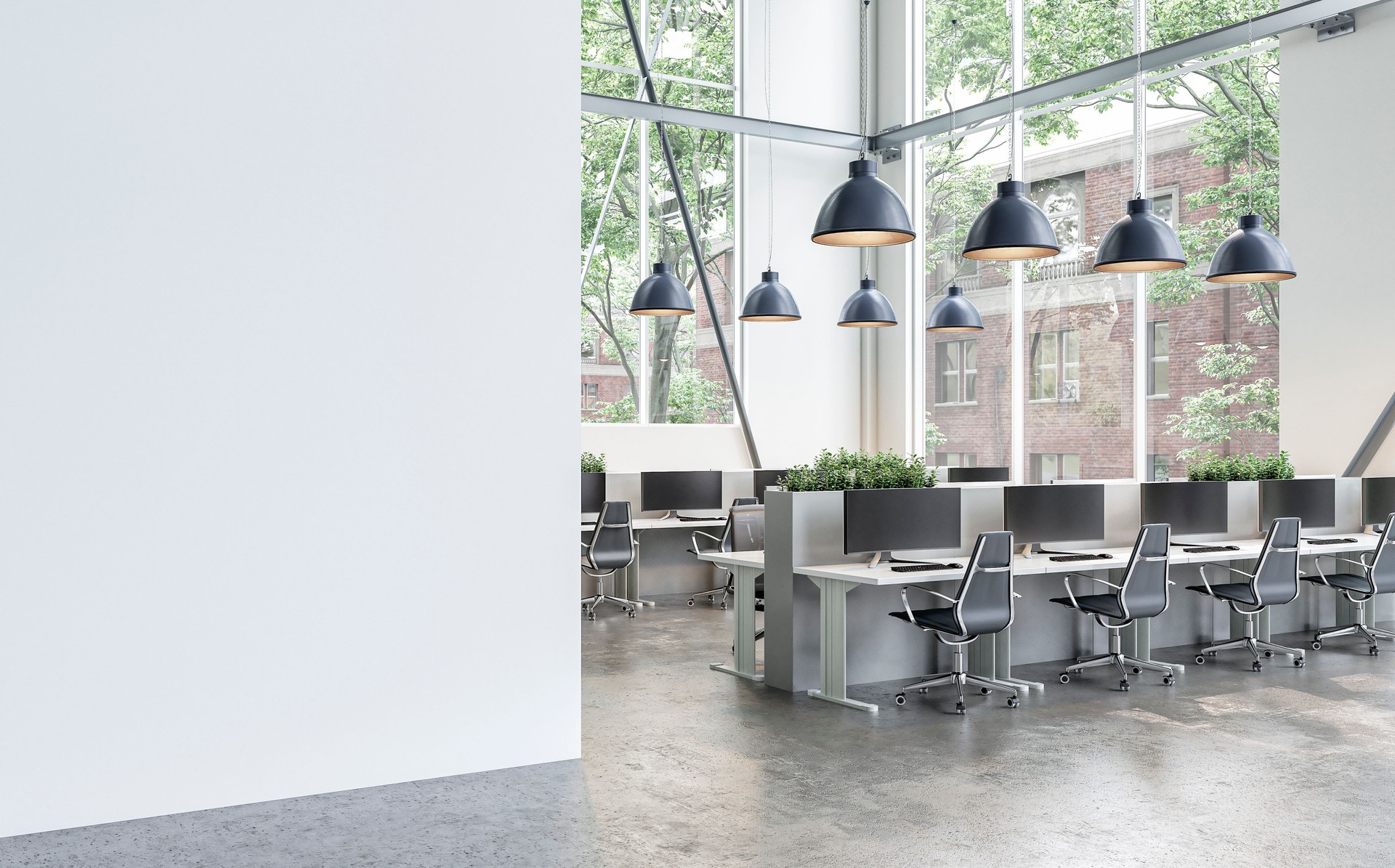 Side view of a semi-empty office interior with white wall and copy space, work desks and large windows.