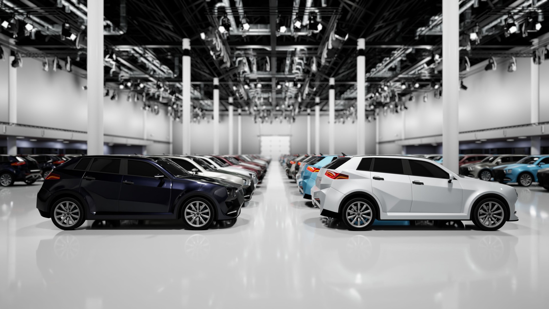 New cars on the factory line waiting to be purchased.